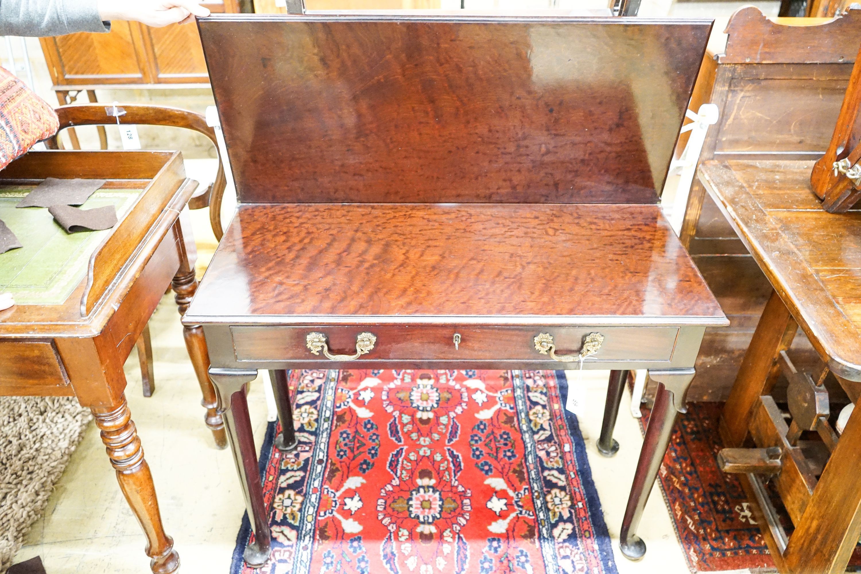 A George II mahogany rectangular folding tea table, width 90cm, depth 41cm, height 72cm